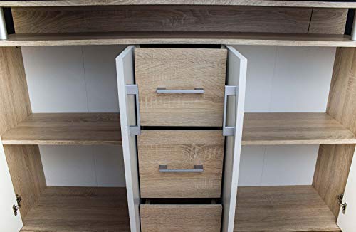 AVANTI TRENDSTORE – Comó in quercia Sonoma / bianco d’imitazione,  con 1 ripiano aperto, 3 cassetti e 4 ante a battente. Dimensioni: LAP 139x90x34 cm - 5